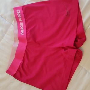 Pink Nike pro compression shorts